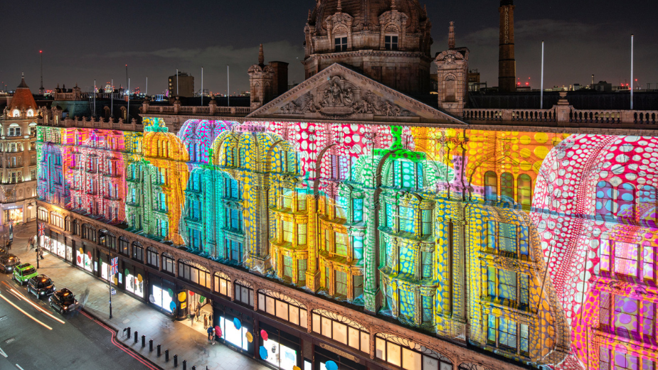 Robot of artist Yayoi Kusama in window of NY Louis Vuitton store