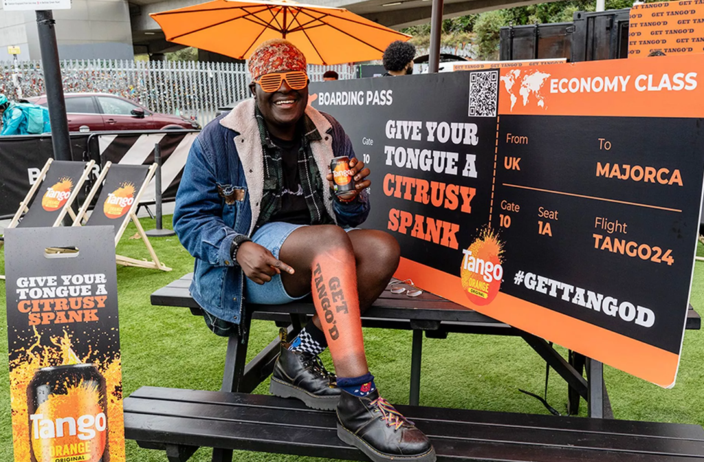 Tango spray paints Londoners orange in exchange for free Majorca ...