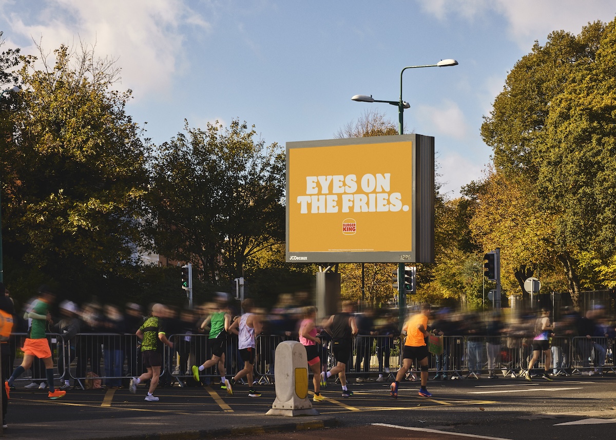 Burger King marathon outdoor campaign placement with food-themed encouragement